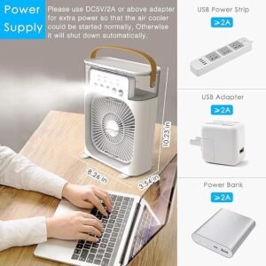 Mini portable USB air cooler and humidifier blowing fresh air on an office desk