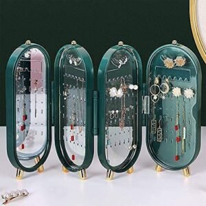 Foldable jewellery box organiser with mirror displaying earrings and necklaces on a dressing table