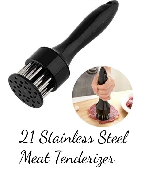 Stainless steel needle meat tenderizer being pressed into a fresh raw beef steak